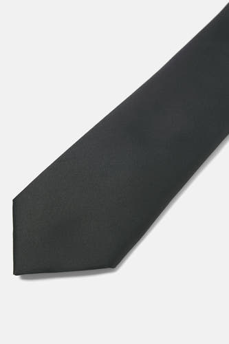 Ceinture noire d'ACCESSORIES BY JACK & JONES, texture unie sur un fond clair.