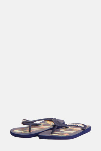 Blauwe slippers van ACCESSORIES BY JACK & JONES, met een opvallende print.
