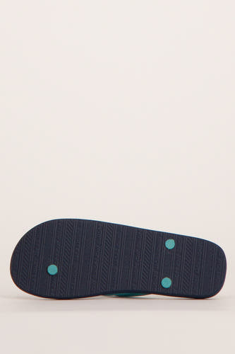 Blauwe slippers van ACCESSORIES BY JACK & JONES, met een geprofileerde zool met merklogo.
