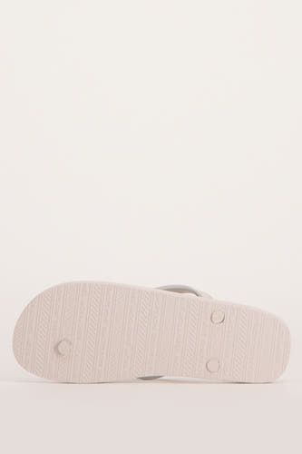 Multikleurige slippers van ACCESSORIES BY JACK & JONES, met een patroon van de merknaam op de zool.

