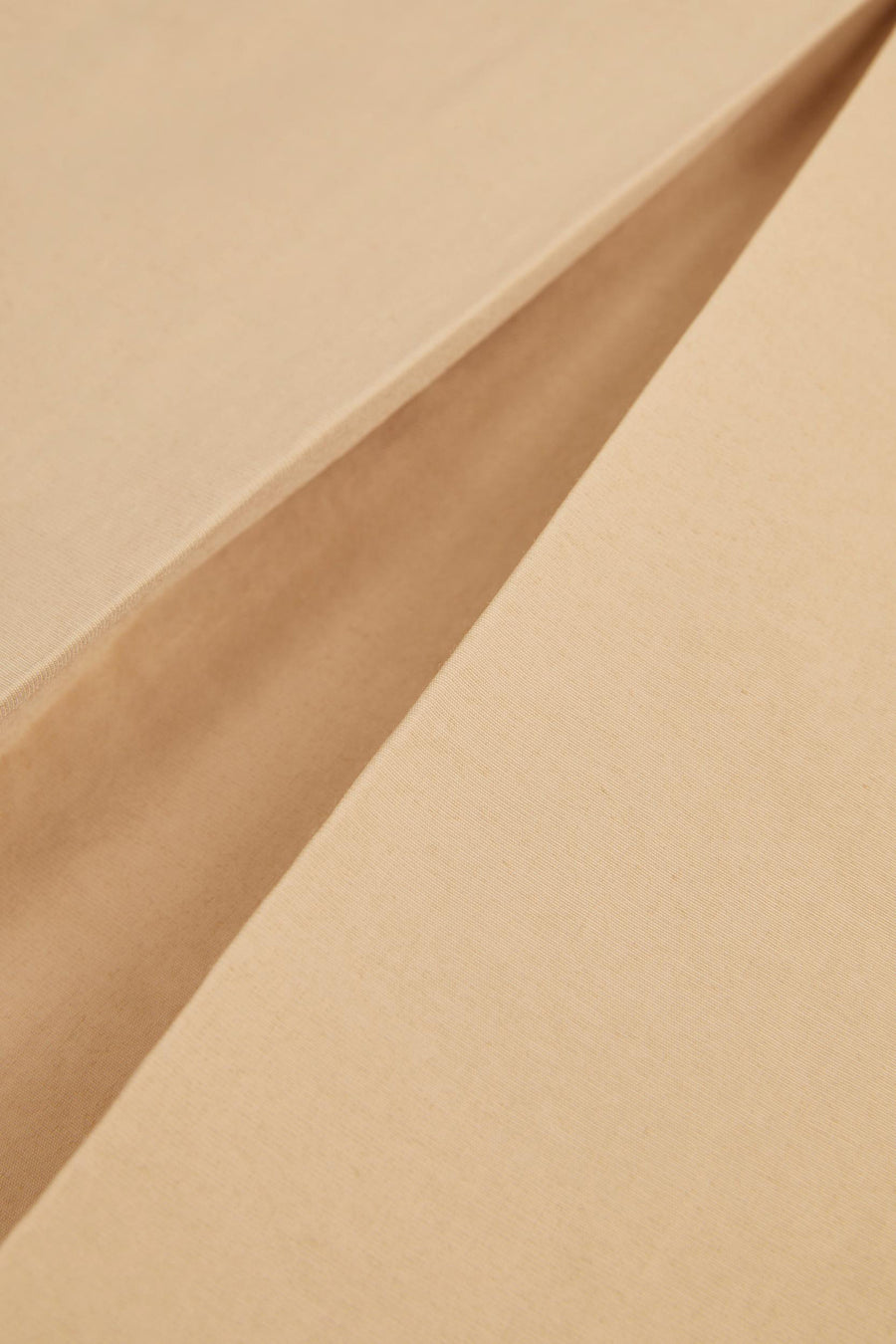 Beige korte rok van JJXX, met een subtiele textuur en een zachte plooi aan de zijkant.
