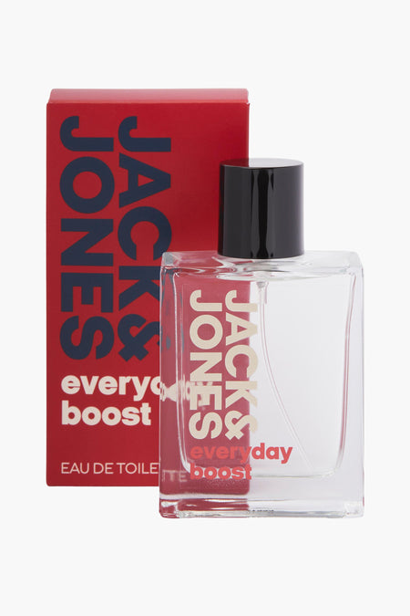 Parfum rouge d'ACCESSORIES BY JACK & JONES, avec un bouchon noir et le nom de la marque imprimé sur le devant.