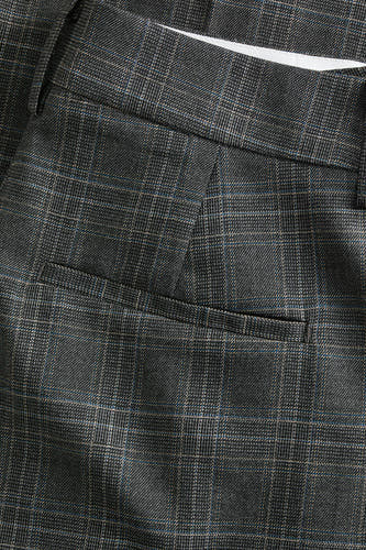 Pantalon de costume gris JJXX, avec un motif de carreaux subtil et un détail de poche à l'arrière.