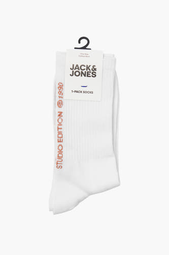 Chaussettes blanches d'ACCESSORIES BY JACK & JONES, avec une impression de texte orange sur le côté.