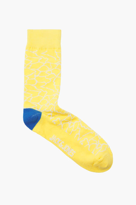 Gele sokken van ACCESSORIES BY JACK & JONES met witte print en blauwe teen.