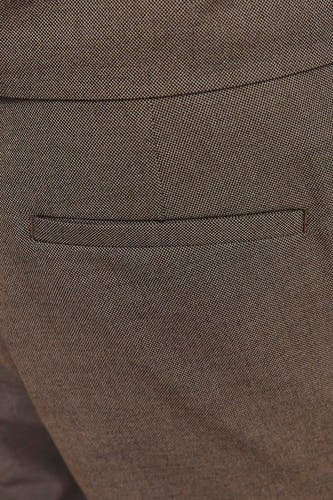 Pantalon de costume gris de PREMIUM by JACK & JONES, avec une texture tissée subtile et un détail poche passepoilée.