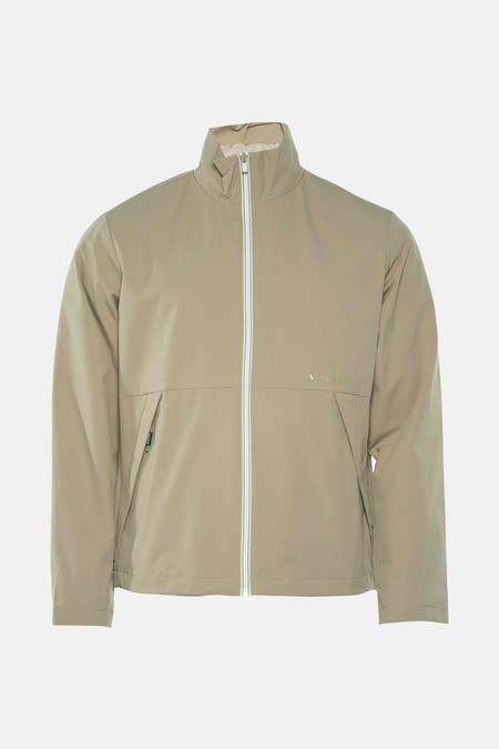 Beige korte jas van CORE BY JACK & JONES met een ritssluiting en zakken aan de zijkant.