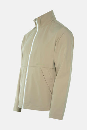 Beige korte jas van CORE by JACK & JONES, met een witte rits en steekzakken.