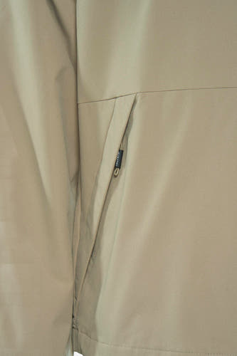 Manteau court beige de CORE par JACK & JONES, avec une poche et un zip.