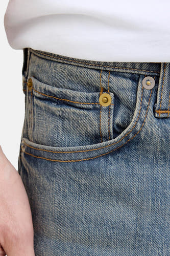 Tapered jeans van denim in middenblauw van JACK & JONES JEANS INTELLIGENCE, met steekzak en gouden accenten.
