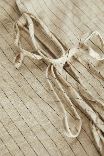 Blouse sans manches beige de JJXX, avec un motif à rayures et des détails en tricot.