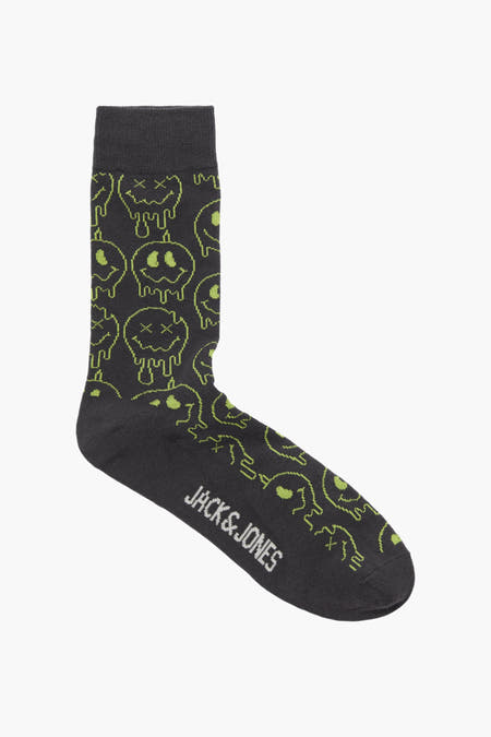 Chaussettes grises d'ACCESSORIES BY JACK & JONES, avec une impression graphique de visages fondants.
