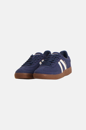 Blauwe sneakers van ACCESSORIES BY JACK & JONES met witte strepen en bruine zool.