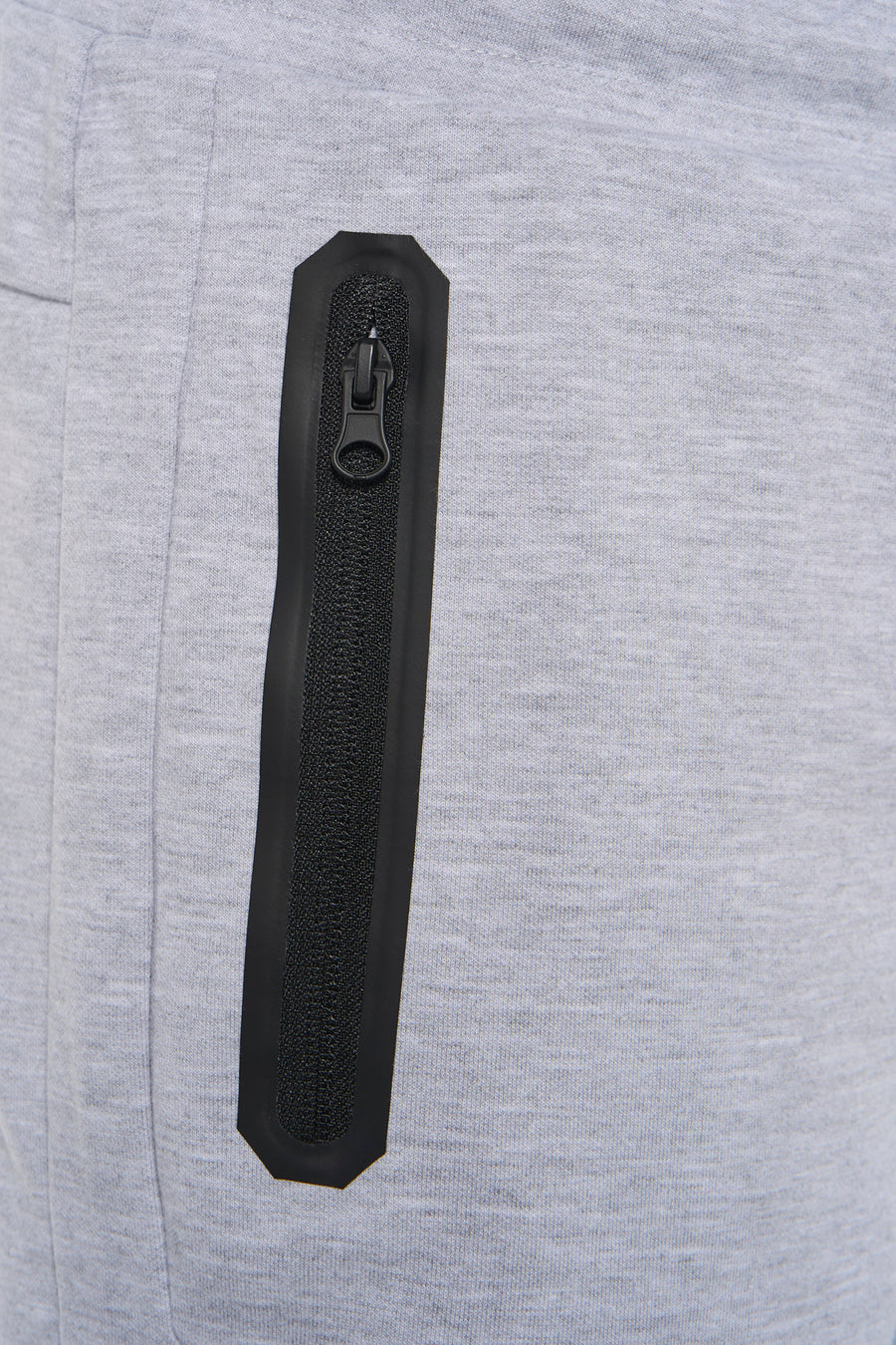 Grijze katoenen shorts van JACK & JONES JEANS INTELLIGENCE met zwarte ritszak, close-up detail