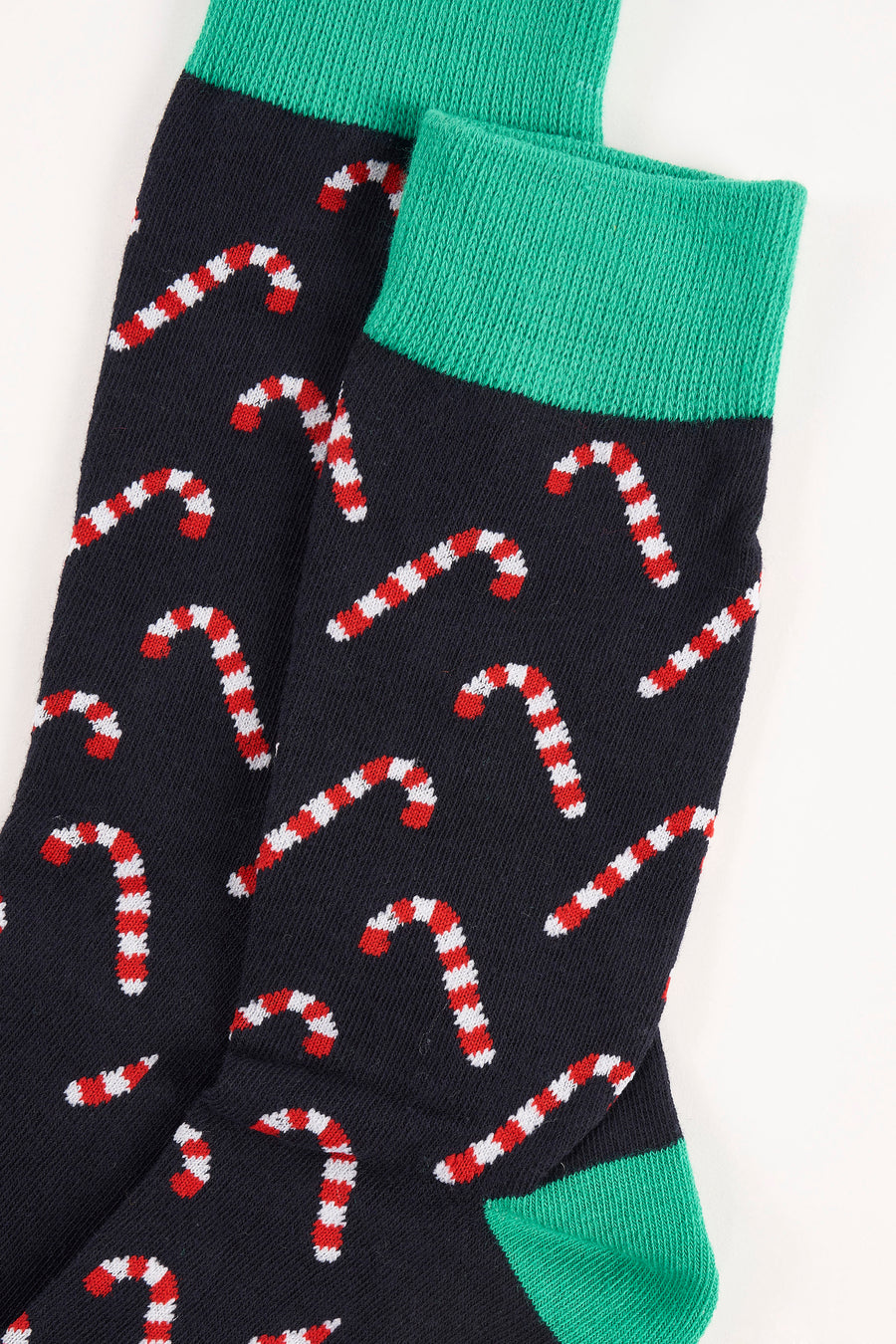 Zwarte sokken van ACCESSORIES BY JACK & JONES, met een kerstthema en een patroon van zuurstokken.
