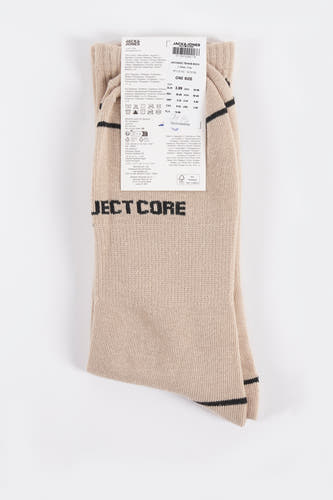 Beige sokken van ACCESSORIES BY JACK & JONES, met donkere strepen en een geribbelde textuur.
