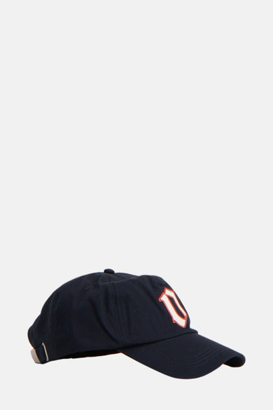 Casquette bleue foncée d'ACCESSORIES BY JACK & JONES, avec une application de lettres blanches sur l'avant.