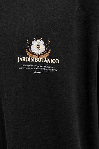 T-shirt noir à manches courtes d'ORIGINALS BY JACK & JONES, avec une image de fleurs et un imprimé texte.