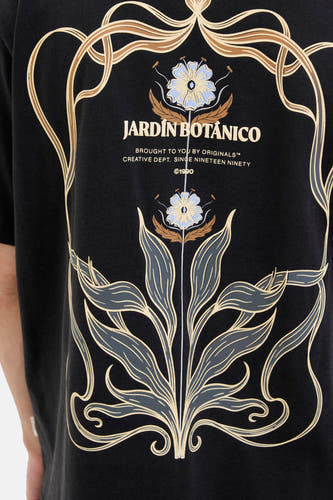 T-shirt noir à manches courtes d'ORIGINALS BY JACK & JONES, avec une impression botanique en beige, bleu et gris.