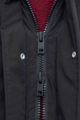 Zwarte lange jas van ORIGINALS BY JACK & JONES, met dubbele ritssluiting en zilverkleurige drukknopen.