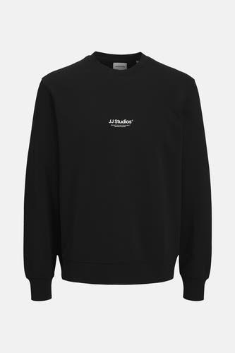 Gilet noir avec col rond de CORE par JACK & JONES, avec une petite impression de texte blanc sur la poitrine.