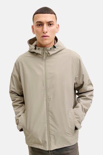 Beige jas van ORIGINALS BY JACK & JONES, met capuchon en ritssluiting, model met de handen in de zakken.
