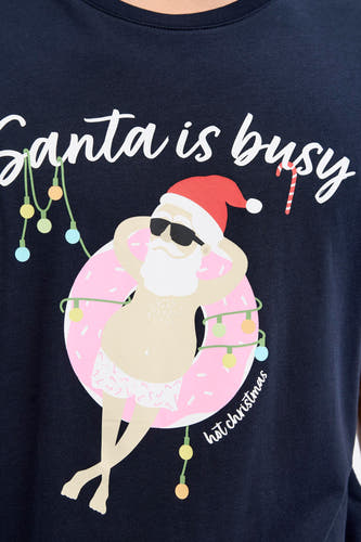 Blauw T-shirt met korte mouwen van ORIGINALS BY JACK & JONES, met een grafische afbeelding van een relaxte kerstman in een zwemband.