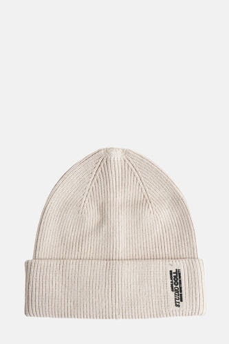 Beige muts van ACCESSORIES BY JACK & JONES, met ribbeltextuur en een label met opschrift.