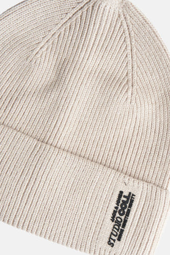 Beige muts van ACCESSORIES BY JACK & JONES met ribgebreide textuur en merklogo.