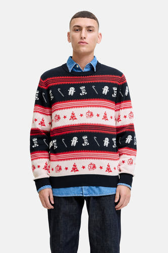 Multikleurige trui met ronde hals van ORIGINALS BY JACK & JONES, met kerstmotieven zoals kerstbomen en gingerbreadmannetjes, gedragen over een denim overhemd met donkere jeans.
