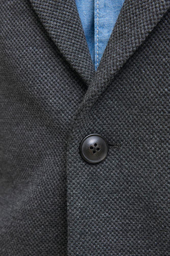 Blazer gris de PREMIUM par JACK & JONES, avec une texture tissée et un col boutonné.