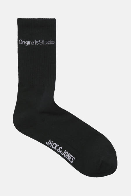 Chaussettes noires d'ACCESSORIES BY JACK & JONES, avec logo de marque et texte "Originals Studio" sur la tige.