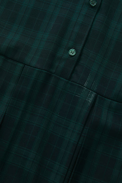 Blauwe jurk met korte mouwen van JJXX, met een tartan ruitpatroon en knopen.
