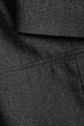 Grijs blazer van JJXX, met een subtiele textuur en een klassieke revers, close-up.
