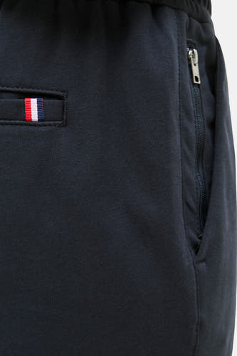Blauwe broek van JACK & JONES JEANS INTELLIGENCE, met een zak met rits en een detail met strepen.