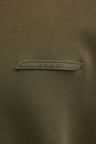 Gilet de coton de CORE BY JACK & JONES, avec un détail logo sur la poitrine et une texture finement tricotée.