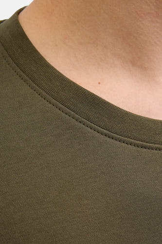 Gilet de coton de CORE BY JACK & JONES, avec un col rond et une texture fine tricotée.