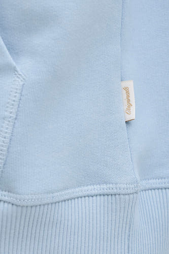 Pull bleu de ORIGINALS BY JACK & JONES avec un bord-côte fin et une étiquette tissée 'Originals' sur le côté.