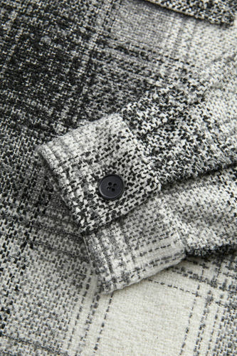 Grijs gilet van CORE BY JACK & JONES, met een geruit patroon en knoop detail op de mouw.