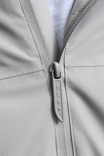 Korte grijze jas van CORE BY JACK & JONES, met een ritssluiting en subtiele stiksels.