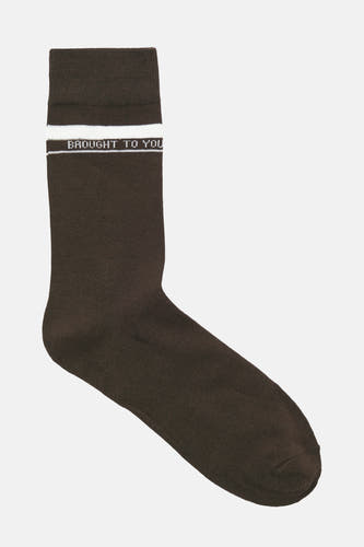 Bruine sokken van ACCESSORIES BY JACK & JONES, met witte streep en tekst "Brought to you".