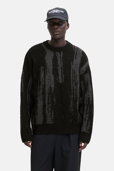 Sweat-shirt noir à col rond de CORE BY JACK & JONES, avec un motif rayé vertical flou.
