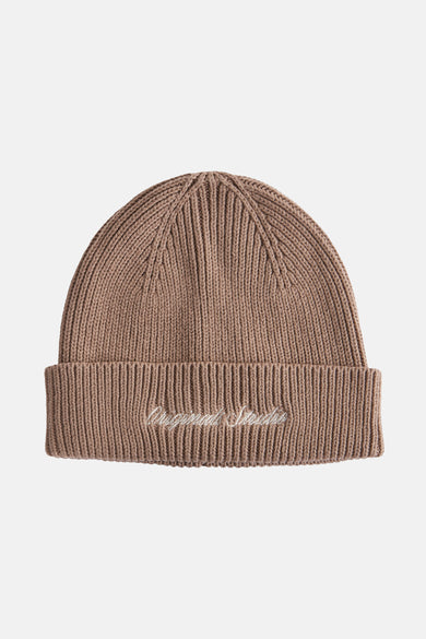 Beige muts van ACCESSORIES BY JACK & JONES, met een geribbelde textuur en borduursel op de omslag.