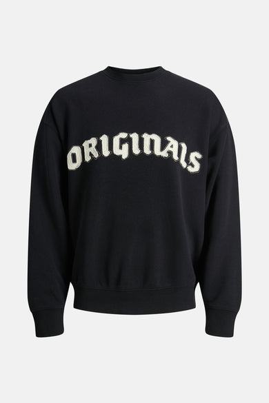 Gilet noir d'ORIGINALS BY JACK & JONES, avec un texte 'Originals' de couleur crème sur la poitrine.