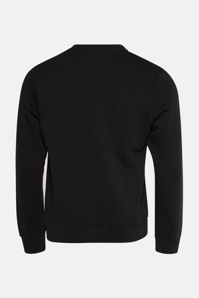 Zwarte sweater van CORE BY JACK & JONES, achterkant weergegeven, met lange mouwen en ronde hals.