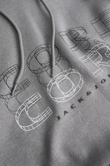 Grijze sweater met kap van CORE BY JACK & JONES, met grafische print en trekkoord.