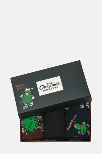Multikleurige sokken van Jack & Jones, in een geschenkverpakking met kerstboomprint en "Holly Jolly" tekst.
