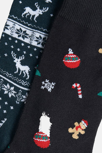 Zwarte sokken van ACCESSORIES BY JACK & JONES met kerstpatronen zoals kerstballen, gingerbread man en sneeuwvlokken.