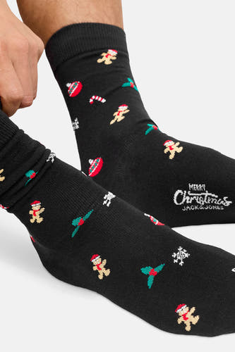 Chaussettes noires d'ACCESSORIES BY JACK & JONES, avec des personnages de Noël comme des bonhommes de pain d'épice et des boules de Noël.