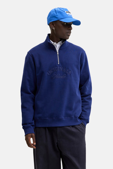 Gilet bleu d'ORIGINALS BY JACK & JONES avec une fermeture à glissière courte et un texte brodé.